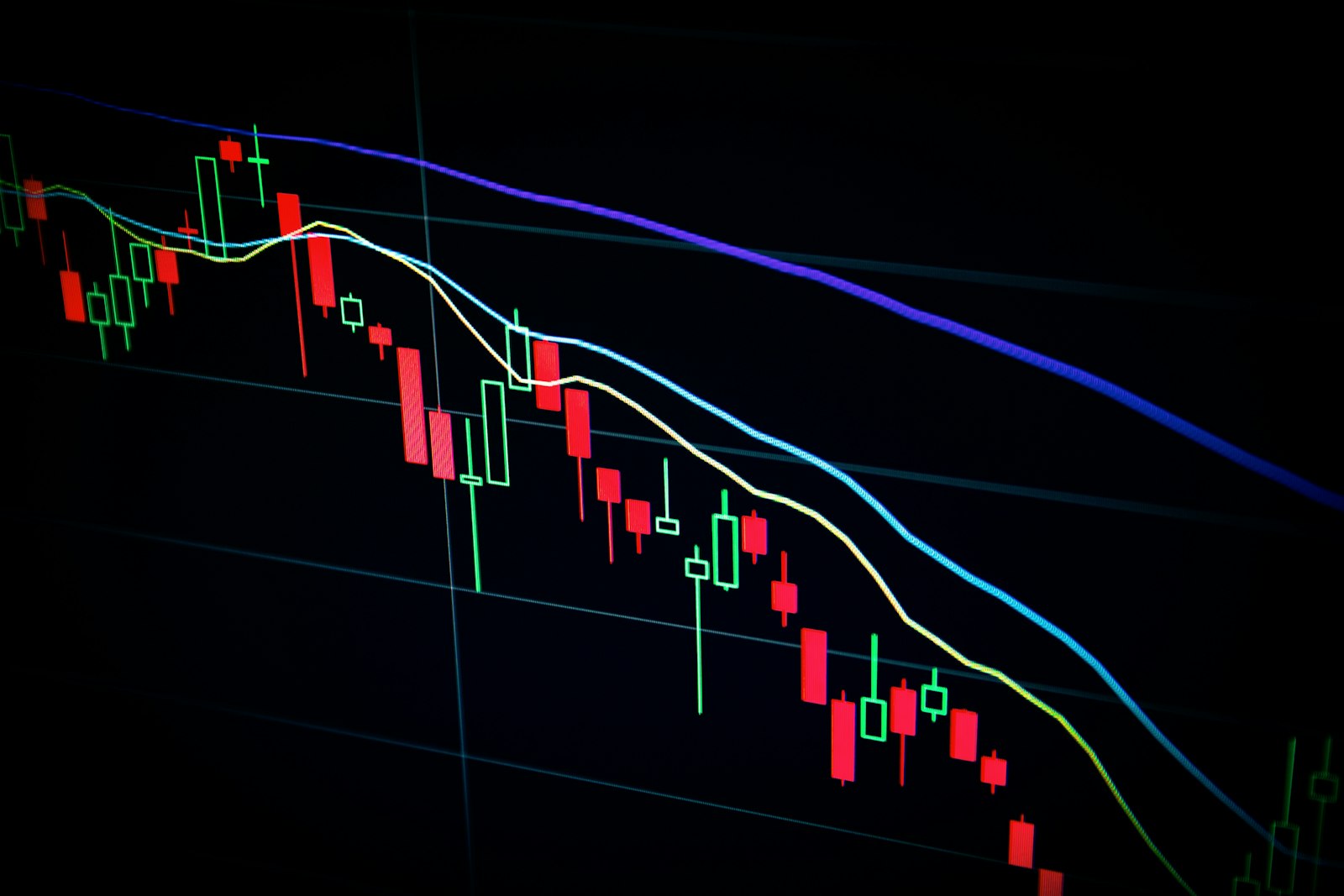 Close-up of financial data on illuminated dashboard screens